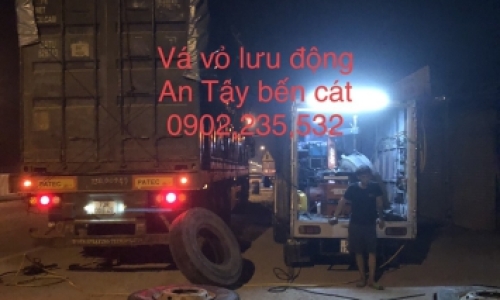 vá lưu động cứu hộ đầu kéo ở đường Nguyễn Chí Thah An Tây Bến Cát (Bình Dương Củ)
